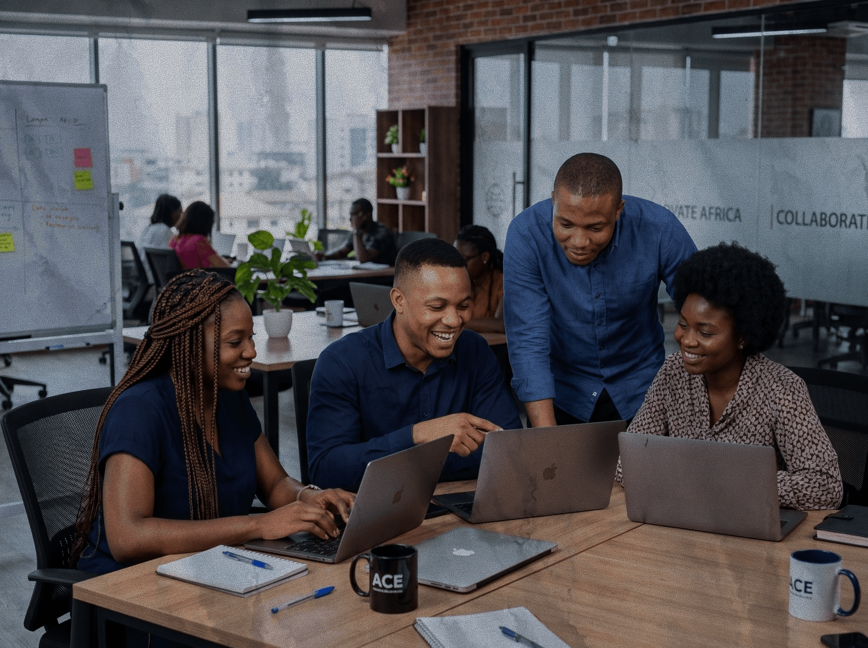 Badger team collaborating in modern office